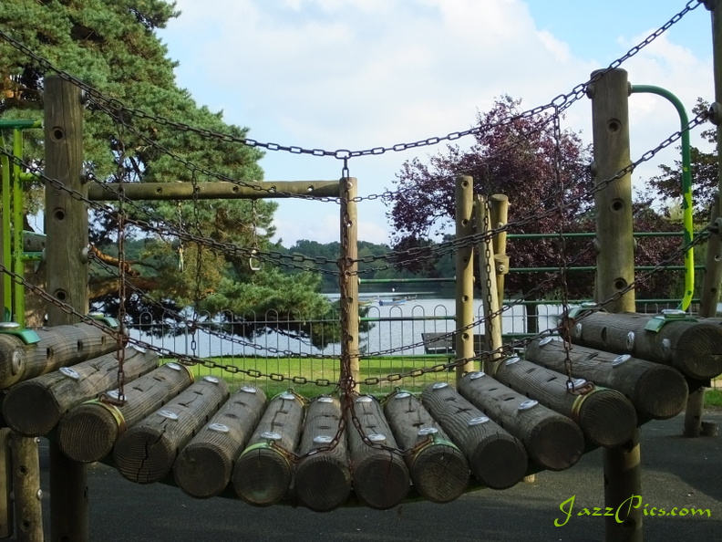 A view of Petersfield lake seen through the climbing frame in the playground area view-of-the-lake-through-climbing-frame.jpg