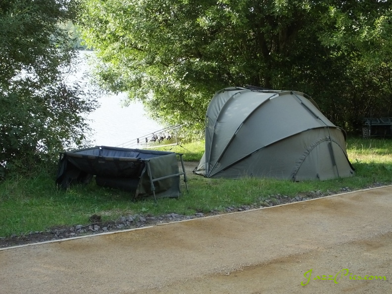 A fisherman sits in his tent quietly fishing by Petersfield lake. With the heron, cormorants, terrapins and gulls, it's surprising that there are any fish left to catch. fishing-by-the-lake.jpg