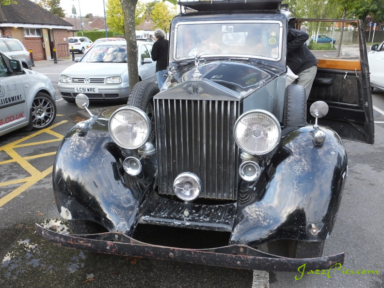 The front view of an un-restored Rolls Royce showing the vintage headlights, and an original spirit of extasy bonnet mascot splendid-unrestored-rolls-royce.jpg